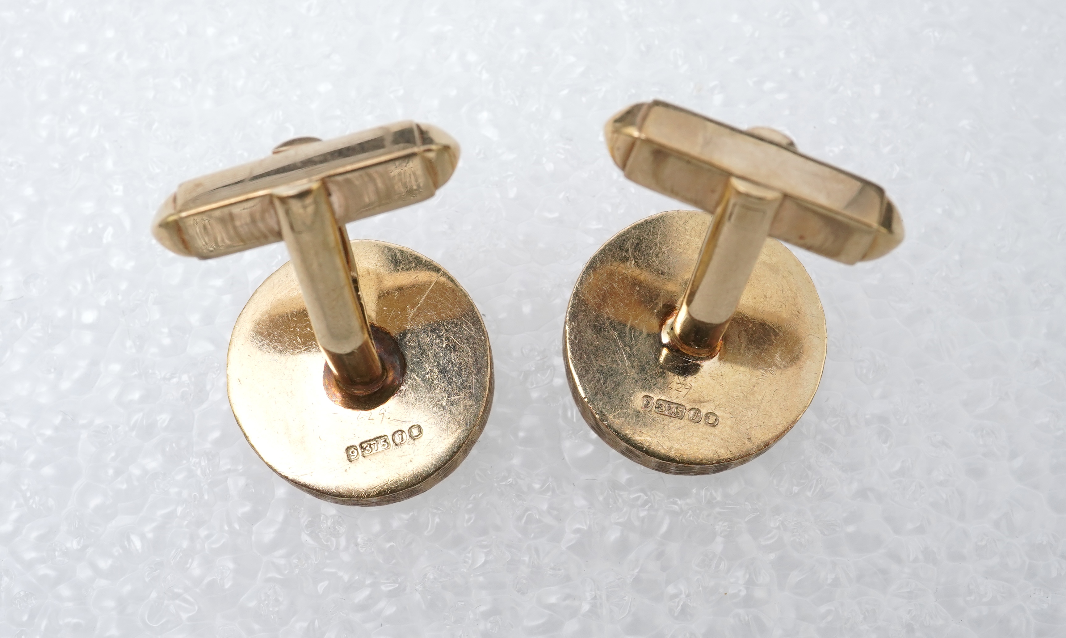 A pair of gold cufflinks, circa 1964